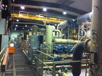 Capturing waste heat in compressor room
